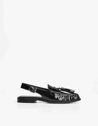Mocassins à pompons sans talon